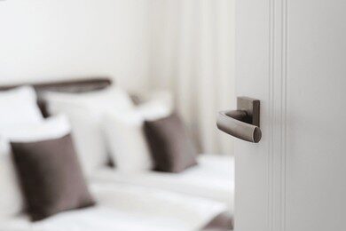 open-door-comfortable-hotel-room-260nw-2446156689